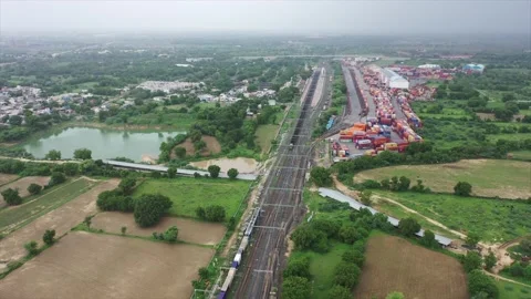 Establish shot intermodal container yard multiple railway tracks Stock Footage 313573477