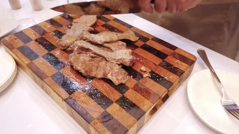 Established Shot of Cooking Medium Rare Beef Steak Stock Footage 132036723