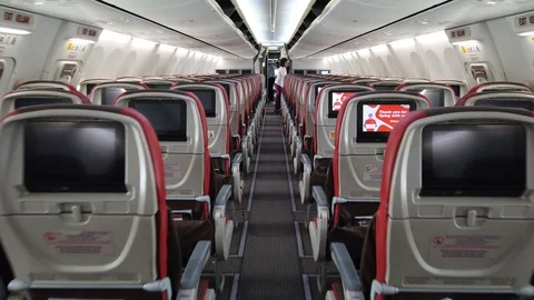 Established Shot of Empty Boeing 737 Passengers Airplane Cabin Stock Footage 129928807