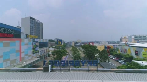 Established Shot of Galuh Mas Main Street Boulevard at Rush Hour Stock-Footage 168917293