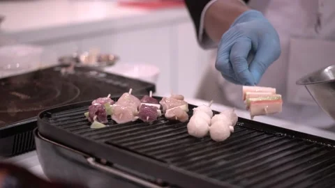 Established Shot Grilling Meat and Crabstick Stock Footage 132016403