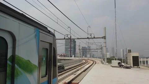 Established Shot of MRT Jakarta Train Leaving Fatmawati Station Stock Footage 132058399
