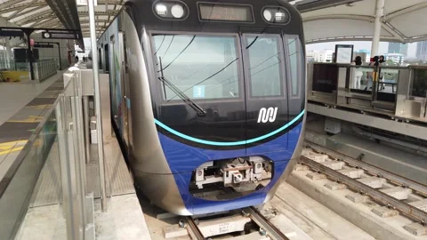 Established Shot of MRT Jakarta Train Leaving Fatmawati Station Stock Footage 132076813