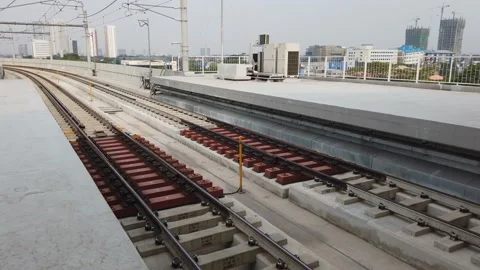 Established Shot of MRT Jakarta Train Entering Fatmawati Station Stock Footage 132078540