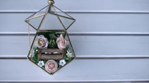 Established Shot of A Pair of Wedding Rings in a Decorated Box Video stock 130621973