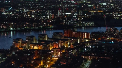 Establishing Aerial View of London, Canary Wharf, Millwall at night, UK Stock Footage