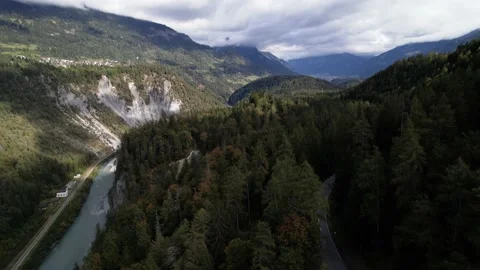 Establishing beautiful mountain and forest panorama in the Swiss Rheinschlucht Stock Footage 163079062