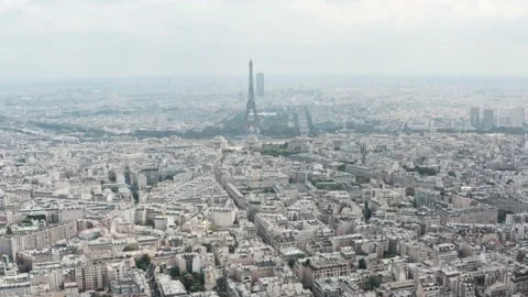 Establishing drone shot of the Eiffel tower Paris overcast day Stock Footage 162521658