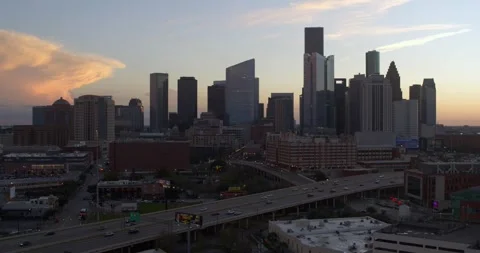 Establishing drone view of downtown Houston cityscape during sunset Stock Footage 297043682