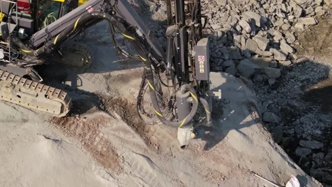 Establishing Shot Above Drill Rig at Construction Site. Active Drilling 動画素材 283359214