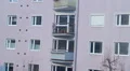Establishing shot of apartment building at daytime, many windows HD Footage