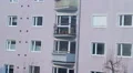 Establishing shot of apartment building at daytime, many windows HD Footage