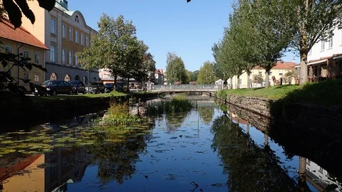 Establishing shot of the bridge over river lillan alingsas sweden Stock Footage 115271489