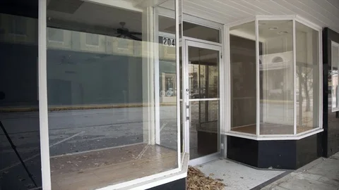 Establishing shot of a closed down small shop or business 4k Stock Footage 71255180
