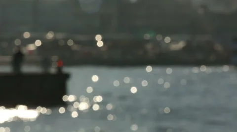 Establishing shot of defocused sunlight reflections on Golden Horn Stock Footage 62300852