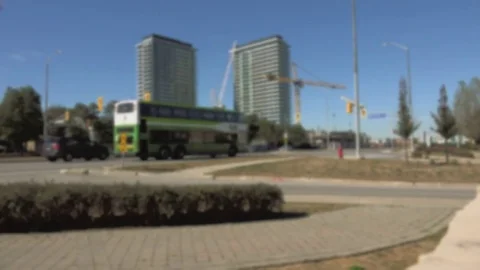Establishing shot. Double Decker Buss in front of construction site. Stock Footage 80783386
