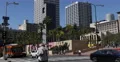 Establishing Shot Downtown Los Angeles LA Public Transportation Bus Passing Cars 4k or 4k+ Resolution
