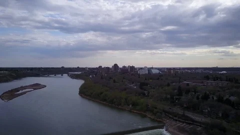 Establishing shot of downtown over river Stock Footage 77711981