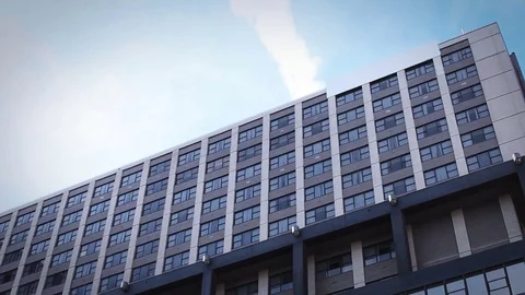 An Establishing shot of Evil Villianous corporate building for action films Stock Footage
