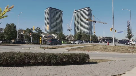 Establishing shot. Highrise buildings and construction cranes. Stock Footage