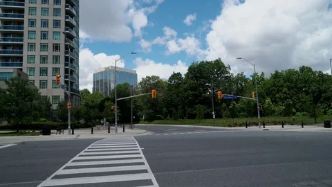 Establishing shot of a intersection in a small town. Stock Footage 76934562