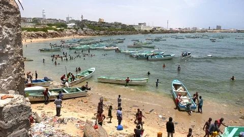 Establishing shot of the lighthouse section of Mogadishu Stock Footage 126221472