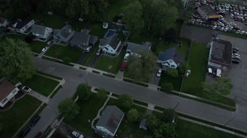 Establishing shot of middle and lower class homes at dusk Stock Footage 223181142