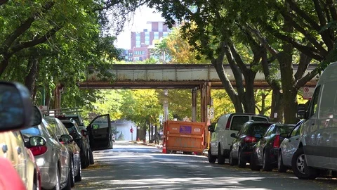 Establishing shot of a neighborhood in downtown Chicago wil El train passing. Stock Footage