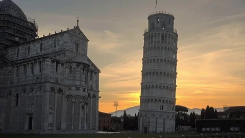 Establishing shot of pisa tower at sunrise Stock Footage