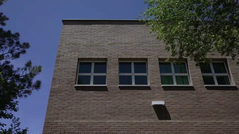 Establishing shot of a plain institutional type building Stock Footage 243523672