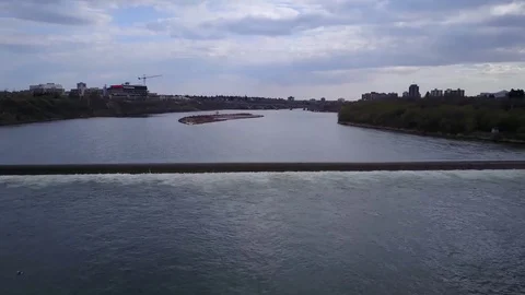 Establishing shot of river weir  Stock Footage 77710769