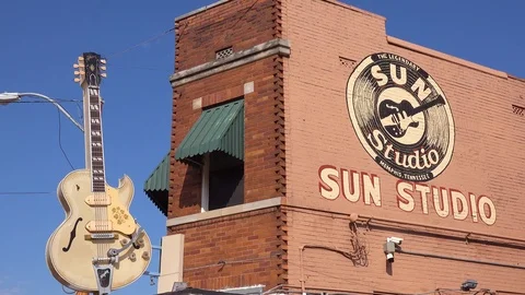 Establishing shot of Sam Phillips Sun Recording studio with guitar hanging Stock Footage 117998874