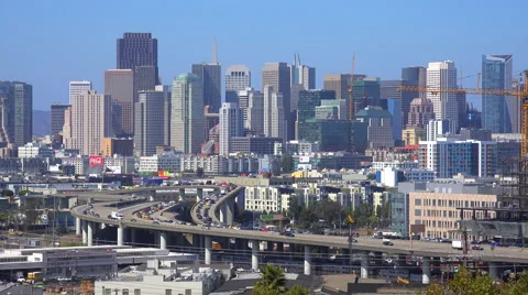 Establishing shot of San Francisco, California with freeways foreground. Stock Footage