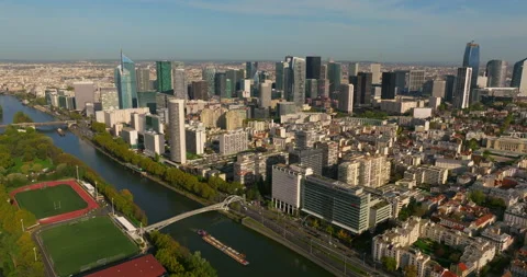 Establishing shot of the streets of Paris in the summer. Drone shot of french Stock Footage 256900979