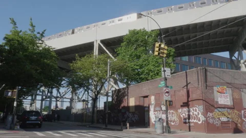 Establishing shot of the subway passing through Gowanus, Brooklyn Stock Footage 276409322