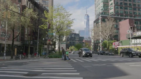 Establishing shot of traffic passing through Lower Manhattan Stock Footage 275602465