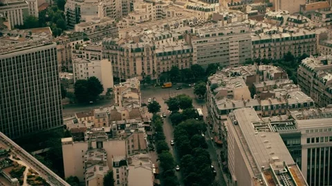 Establishing shot. View from above to roofs and Parisian streets in the city Stock Footage 257932409