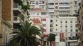 Establishing shot of window in modern European apartment building, cityscape 4k or 4k+ Resolution