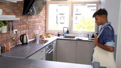 Establishing shot of young couple using recycle cotton bags at home. Stock Footage 119300407
