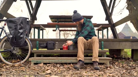 Establishing shot of young man preparing a coffee during winter day, Croatia. Stock Footage 127218372