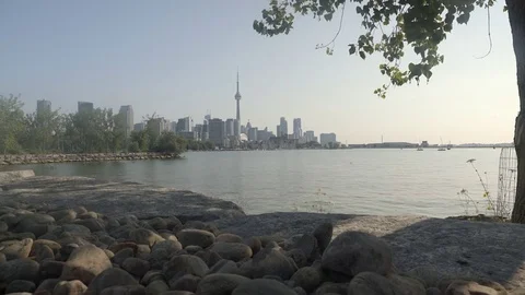 Establishing wide angle shot of Toronto skyline across Lake Ontario. Stock Footage 79184275