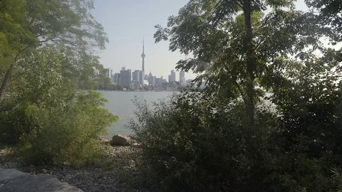Establishing wide angle shot of Toronto skyline across Lake Ontario. Stock Footage 79186404