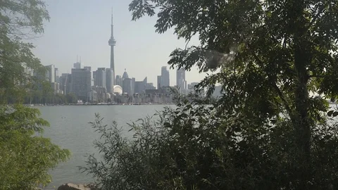 Establishing wide angle shot of Toronto skyline across Lake Ontario. Stock Footage 79186993