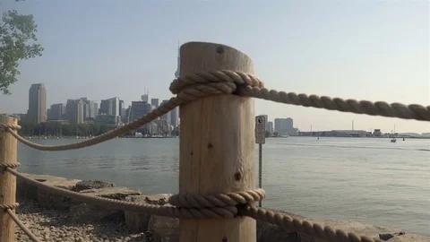 Establishing wide angle shot of Toronto skyline across Lake Ontario. Stock Footage 79188092