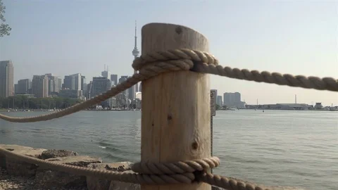 Establishing wide angle shot of Toronto skyline across Lake Ontario. Stock Footage 79189110