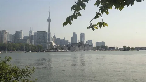 Establishing wide angle shot of Toronto skyline across Lake Ontario. Stock Footage 79190736