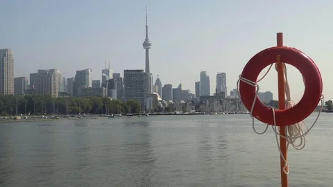 Establishing wide angle shot of Toronto skyline across Lake Ontario. Stock Footage 79191604