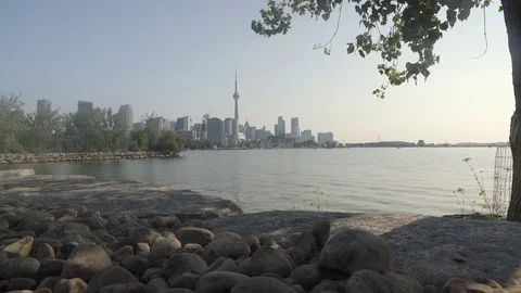 Establishing wide angle shot of Toronto skyline across Lake Ontario. Stock Footage 79192016