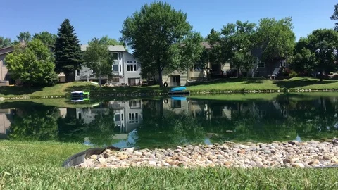 Establishment Shot of Lake Homes in Daytime Stock Footage