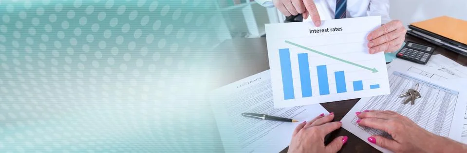 Estate agent showing the decrease of interest rates; panoramic banner Stock Photos